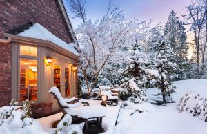 Warm house in the winter snow